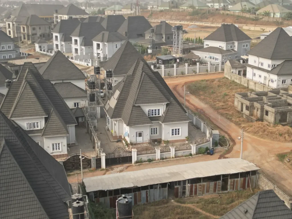 Roofs and water storage tanks at homes in an estate