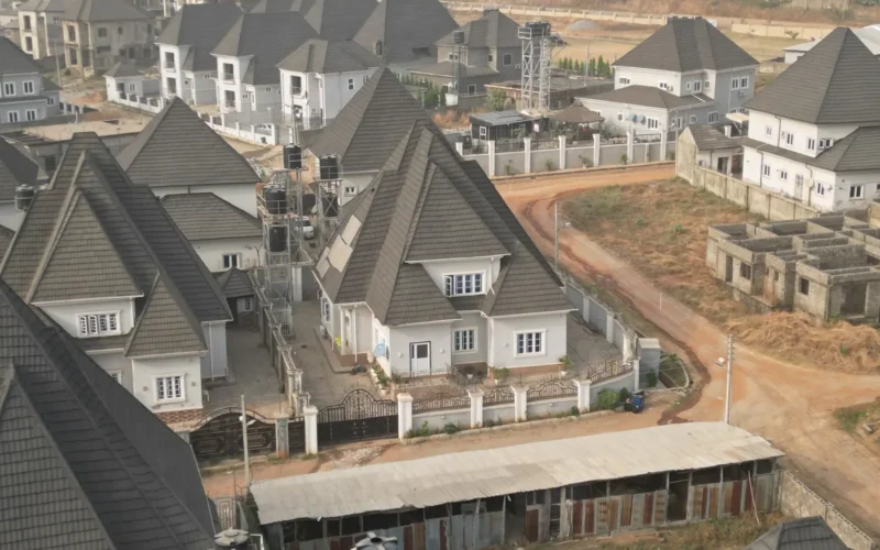 Roofs and water storage tanks at homes in an estate