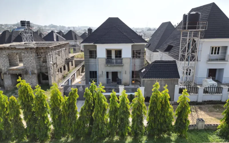Modern homes with tiled roofs in an estate in Abuja